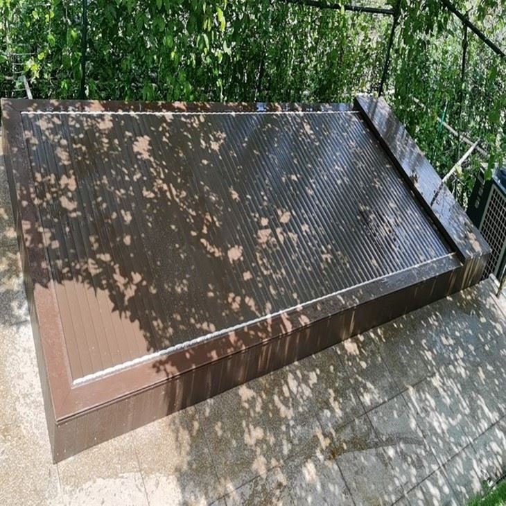 An Alu. Slated Cover For Pool